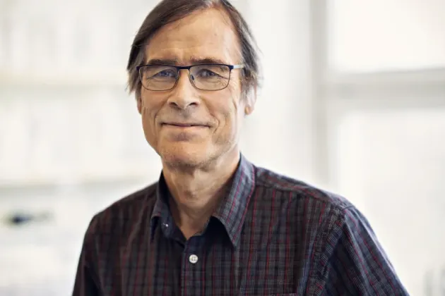 Porträtt på forskare.